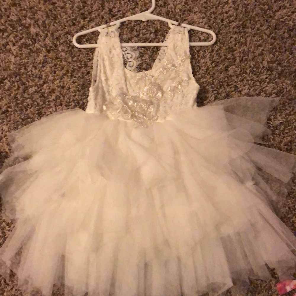Fancy kid’s dress worn as a flower girl dress